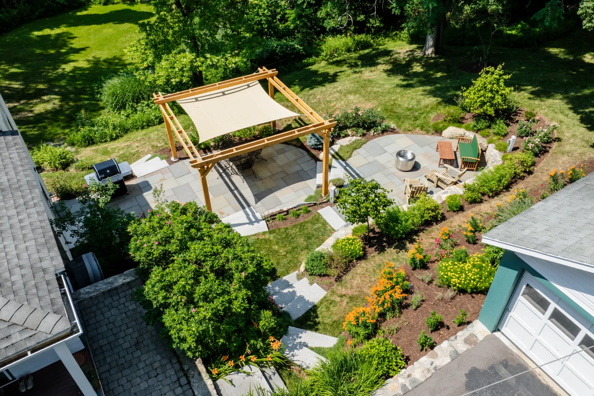 Sloped Backyard Patio & Landscape Design in Framingham